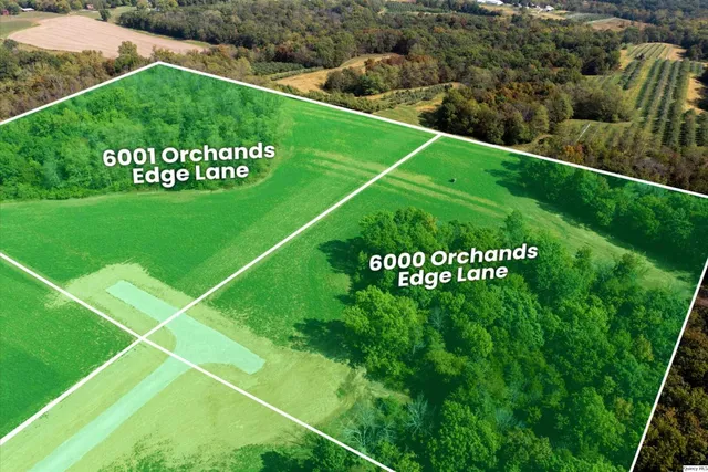 a sign that is sitting on a lush green field