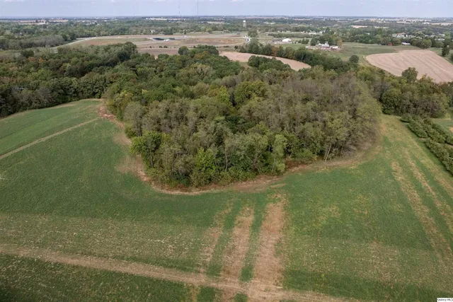 a view of a lake with a yard