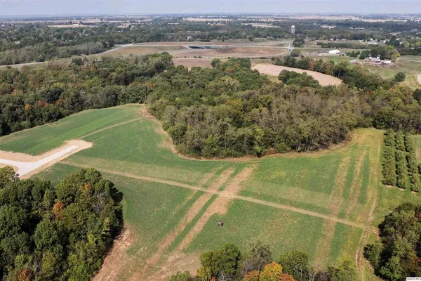 a view of a lake with a yard