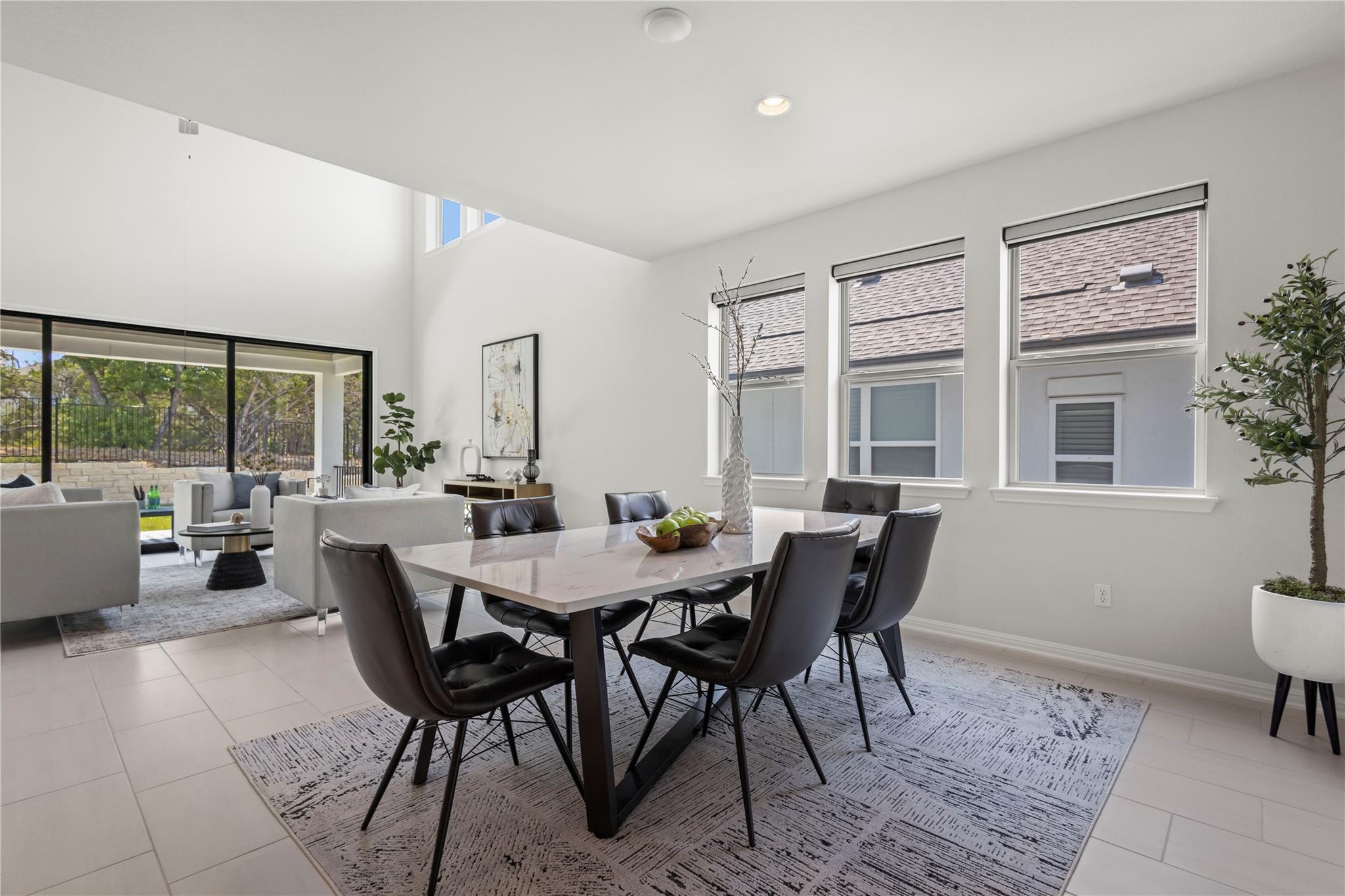 1128 Villa Rialto View Leander, TX 78641 - Photo 13 of 40 Dining space with light tile patterned flooring and recessed lighting