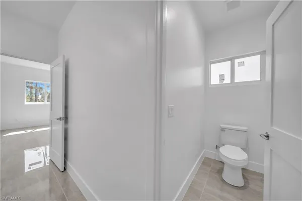 a bathroom with a shower and a sink