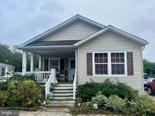 front view of a house with a small yard