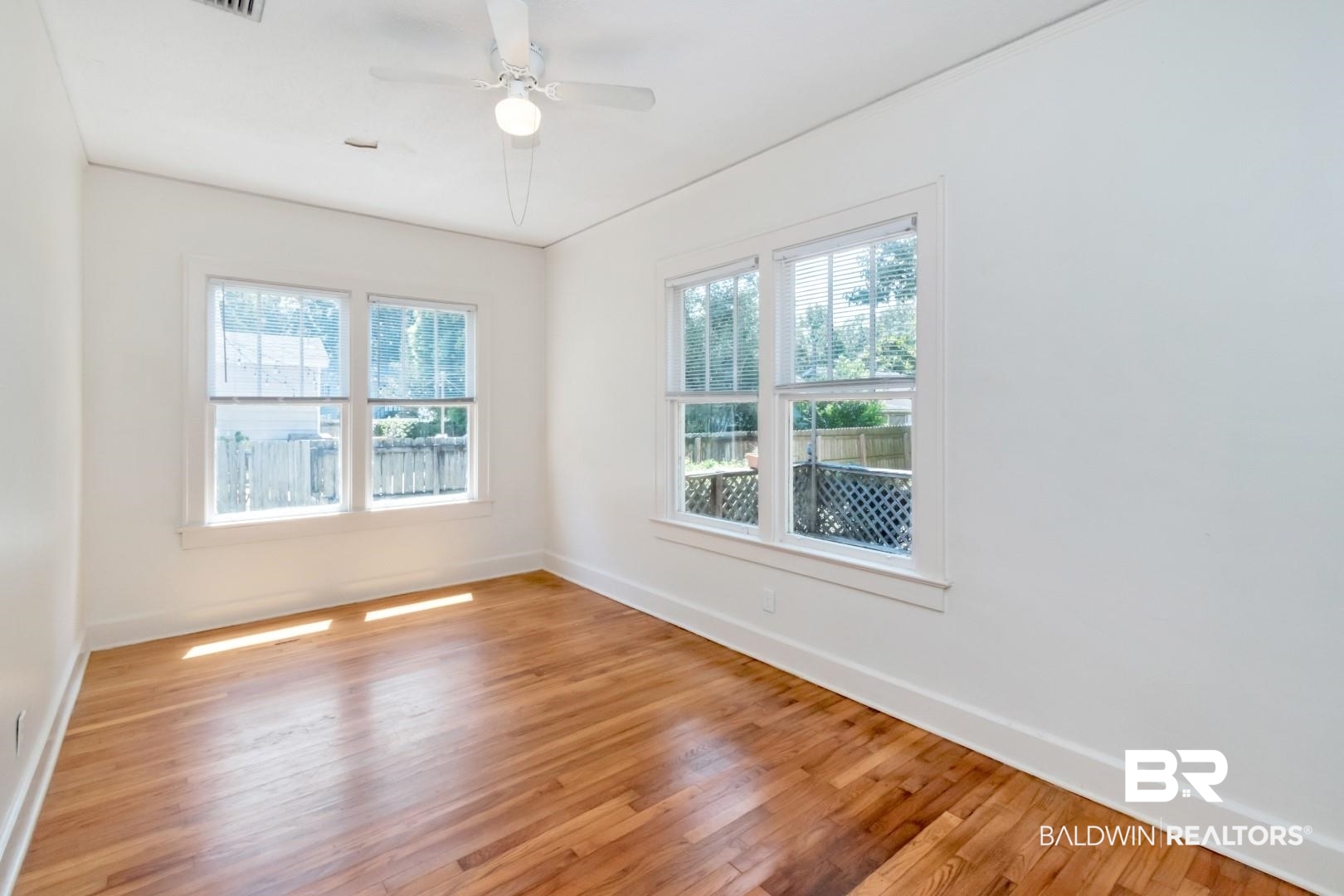 112 South Fulton Street Mobile, AL 36606 - Photo 21 of 35 Spare room with ceiling fan and light hardwood / wood-style floors