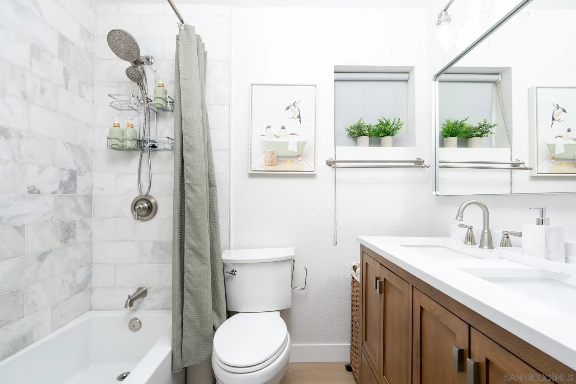 10354 Settle Road Santee, CA 92071 - Photo 27 of 56 a bathroom with a sink a toilet and shower