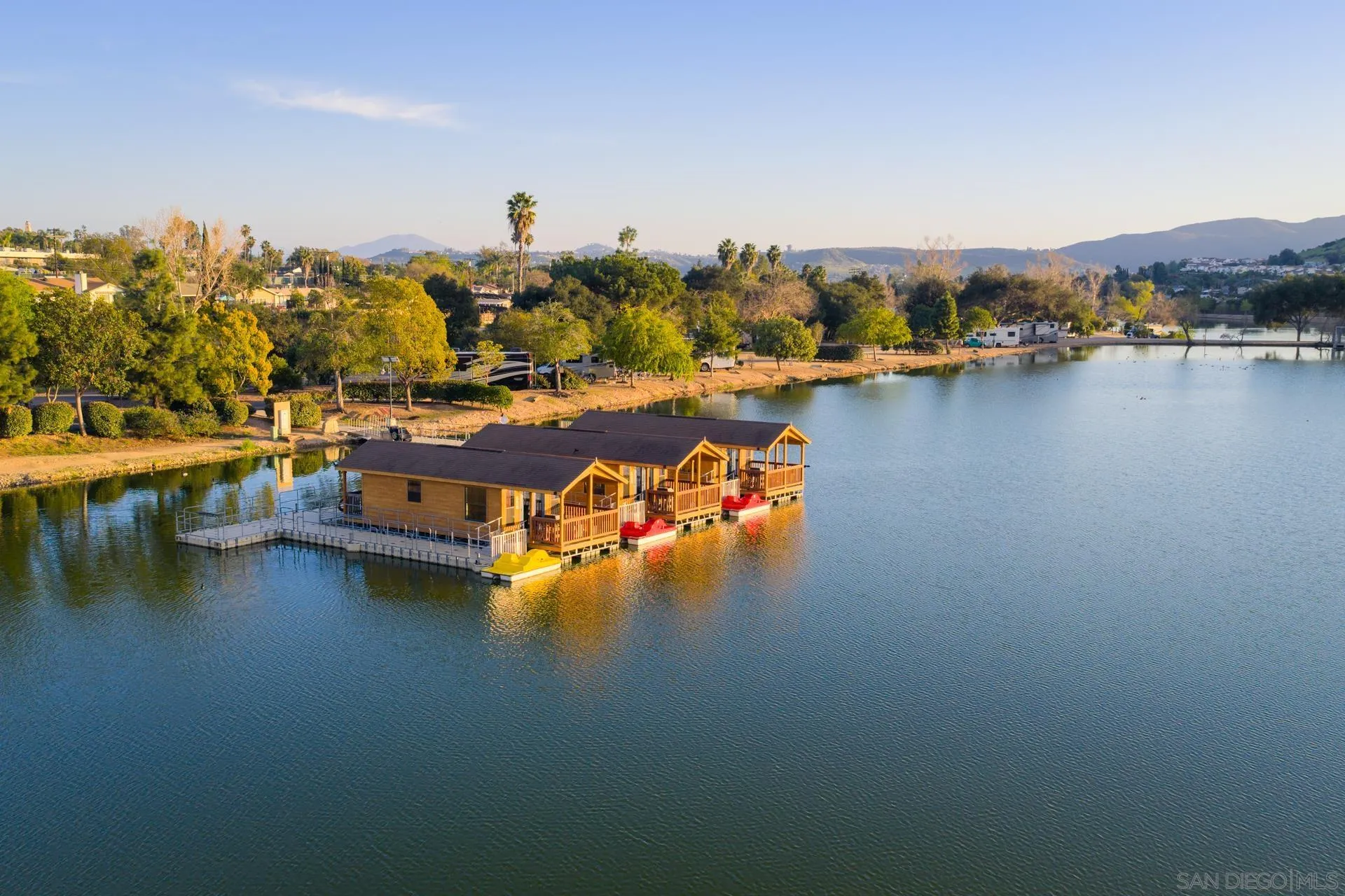 10354 Settle Road Santee, CA 92071 - Photo 40 of 56 a view of a lake with boats and trees in the back