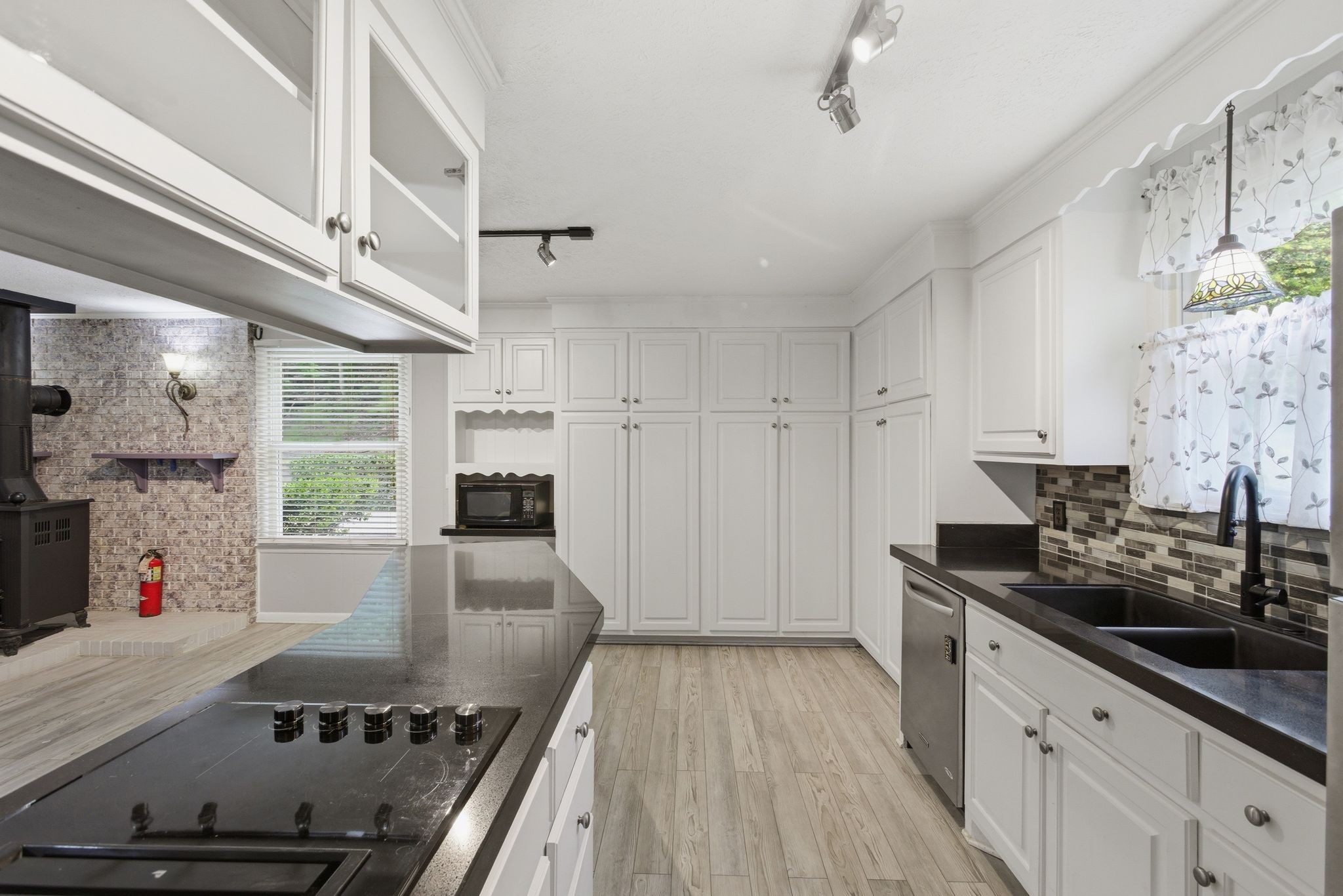 580 Defeated Creek Road Centerville, TN 37033 - Photo 20 of 71 a kitchen with stainless steel appliances granite countertop a stove and a sink