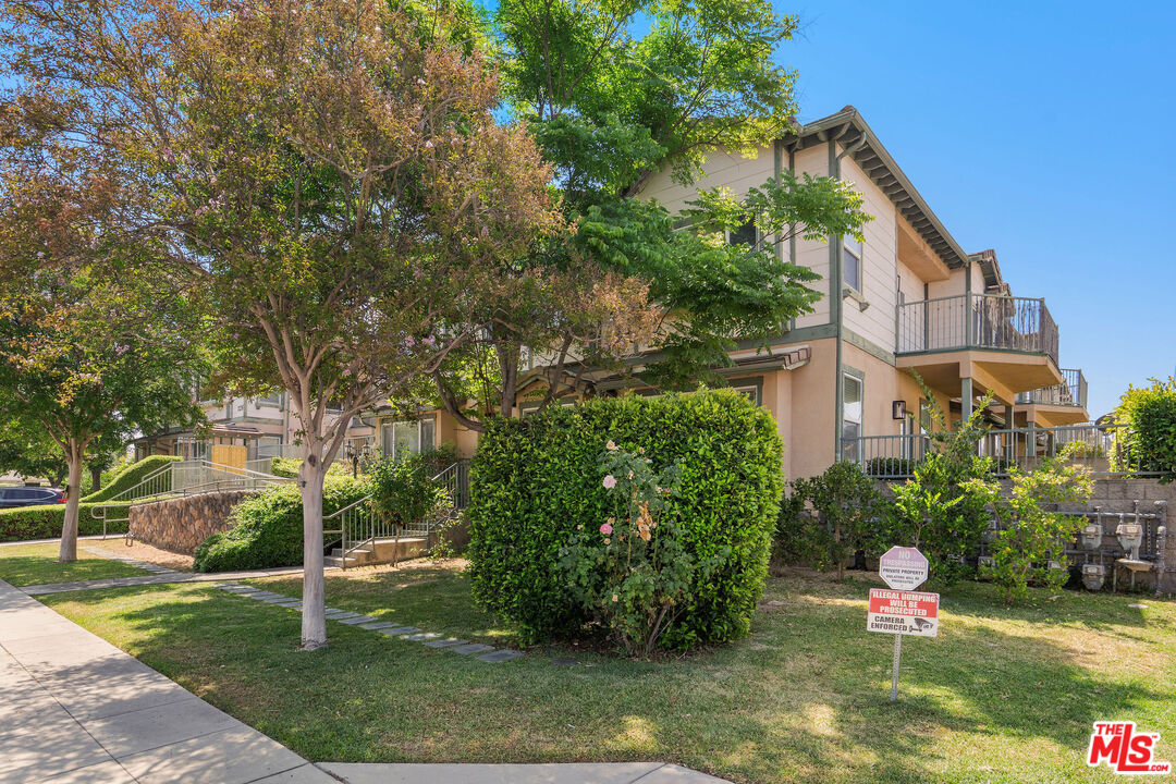 1128 West Duarte Road, Unit A Arcadia, CA 91007 - Photo 2 of 28 front view of a house with a yard