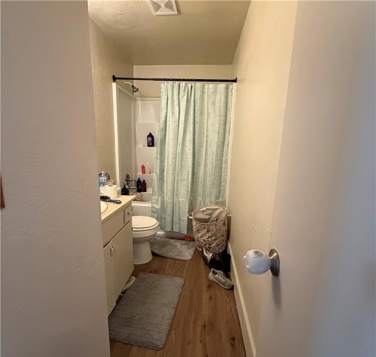 1567 Ellen Court Merced, CA 95341 - Photo 12 of 16 a bathroom with a sink a toilet and shower