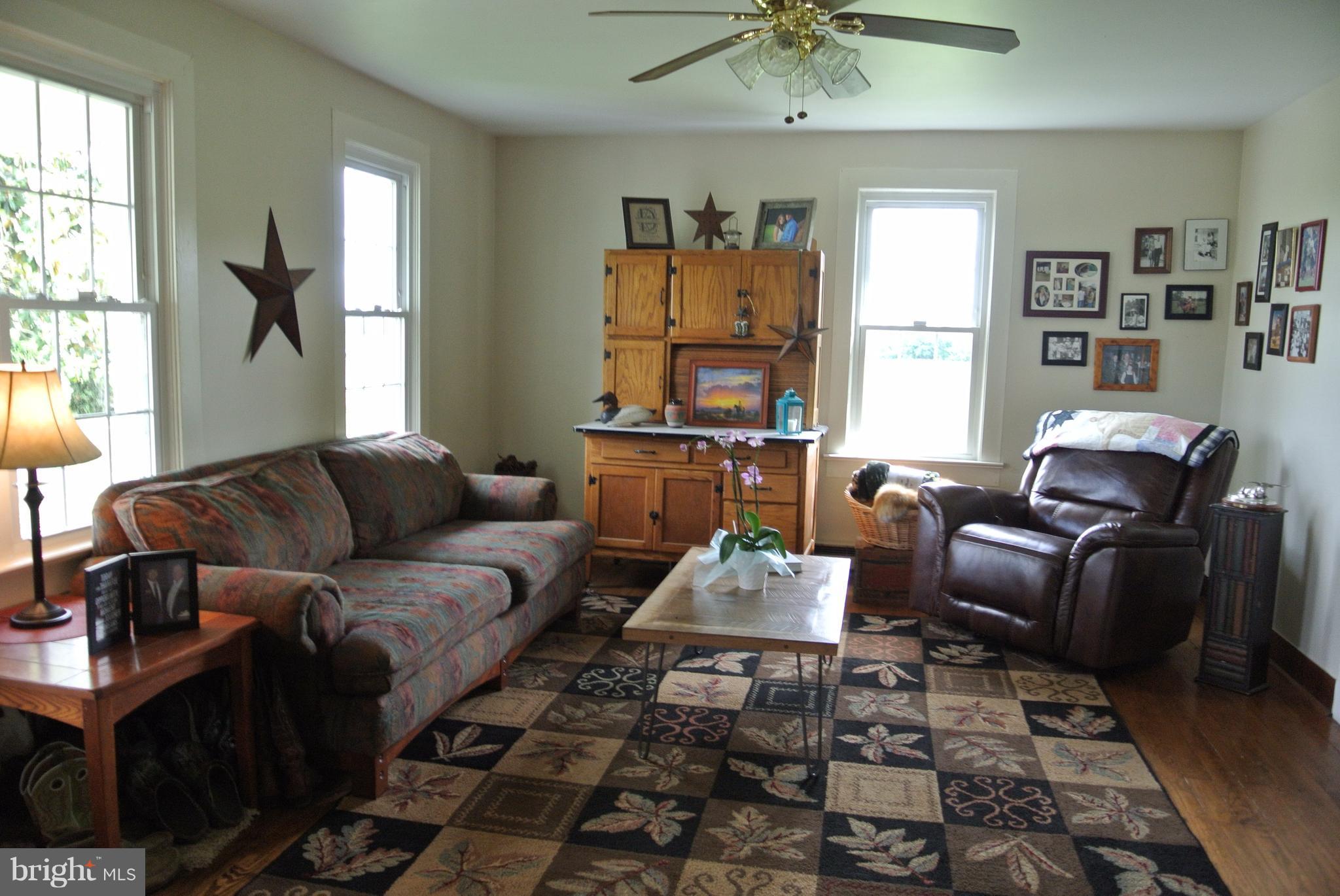 12047 Elk Run Road Catlett, VA 20119 - Photo 10 of 29 living room with fan