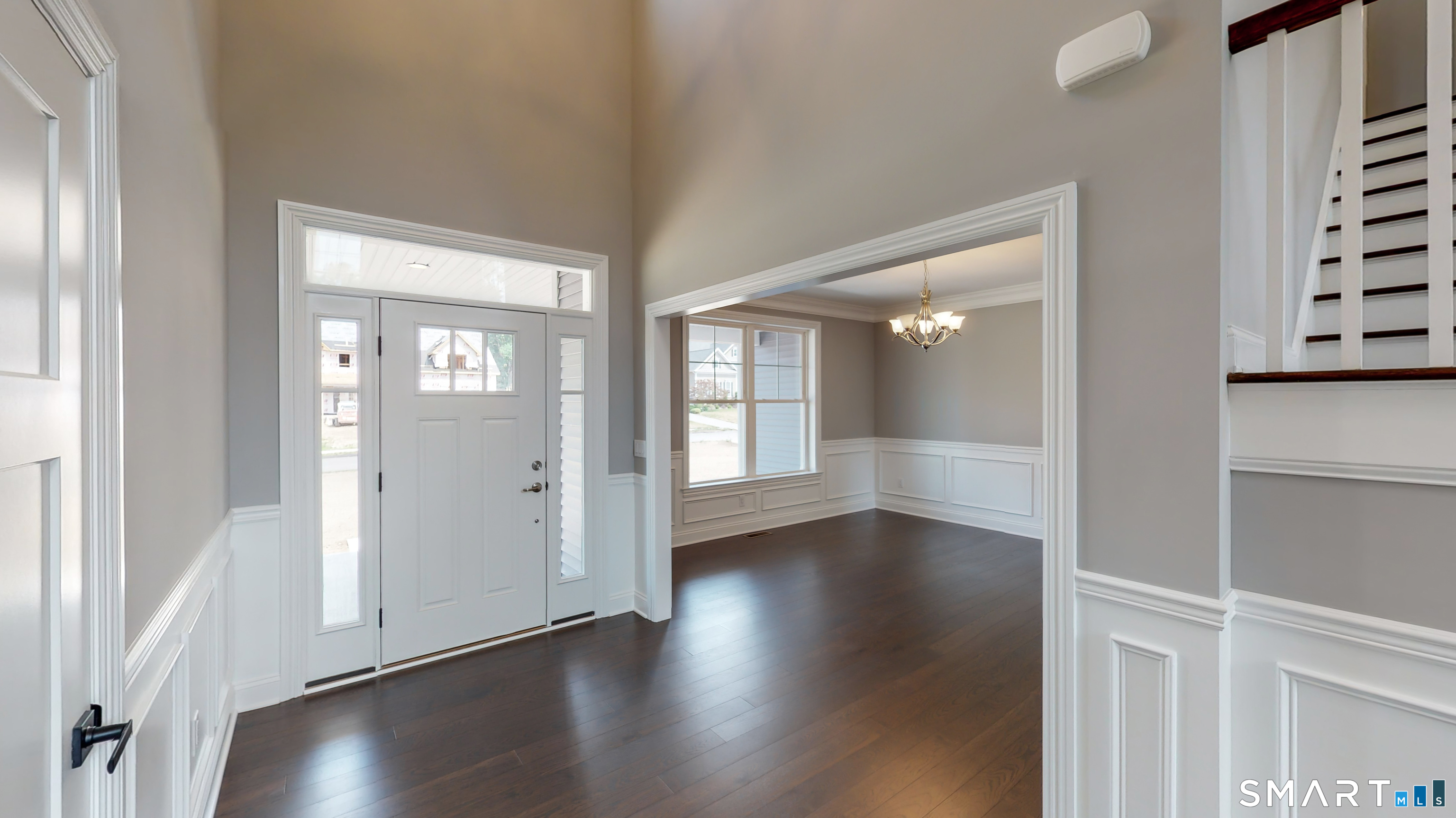 18 Twin Valley Road East Lyme, CT 06333 - Photo 4 of 26 a view of an empty room with wooden floor and a window