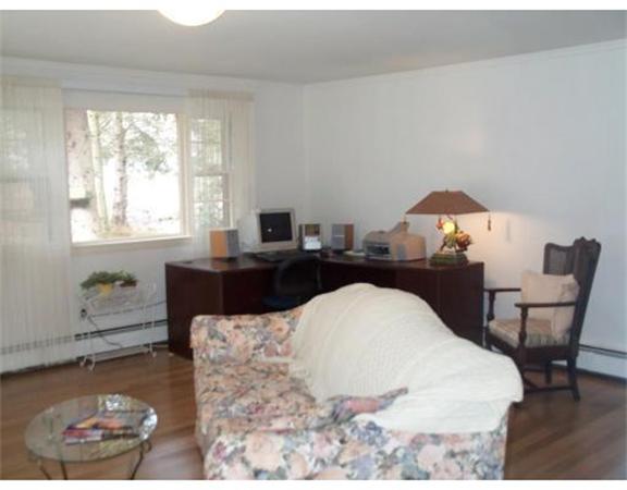 17 Donna Road Chelmsford, MA 01824 - Photo 3 of 12 a living room with furniture and a window
