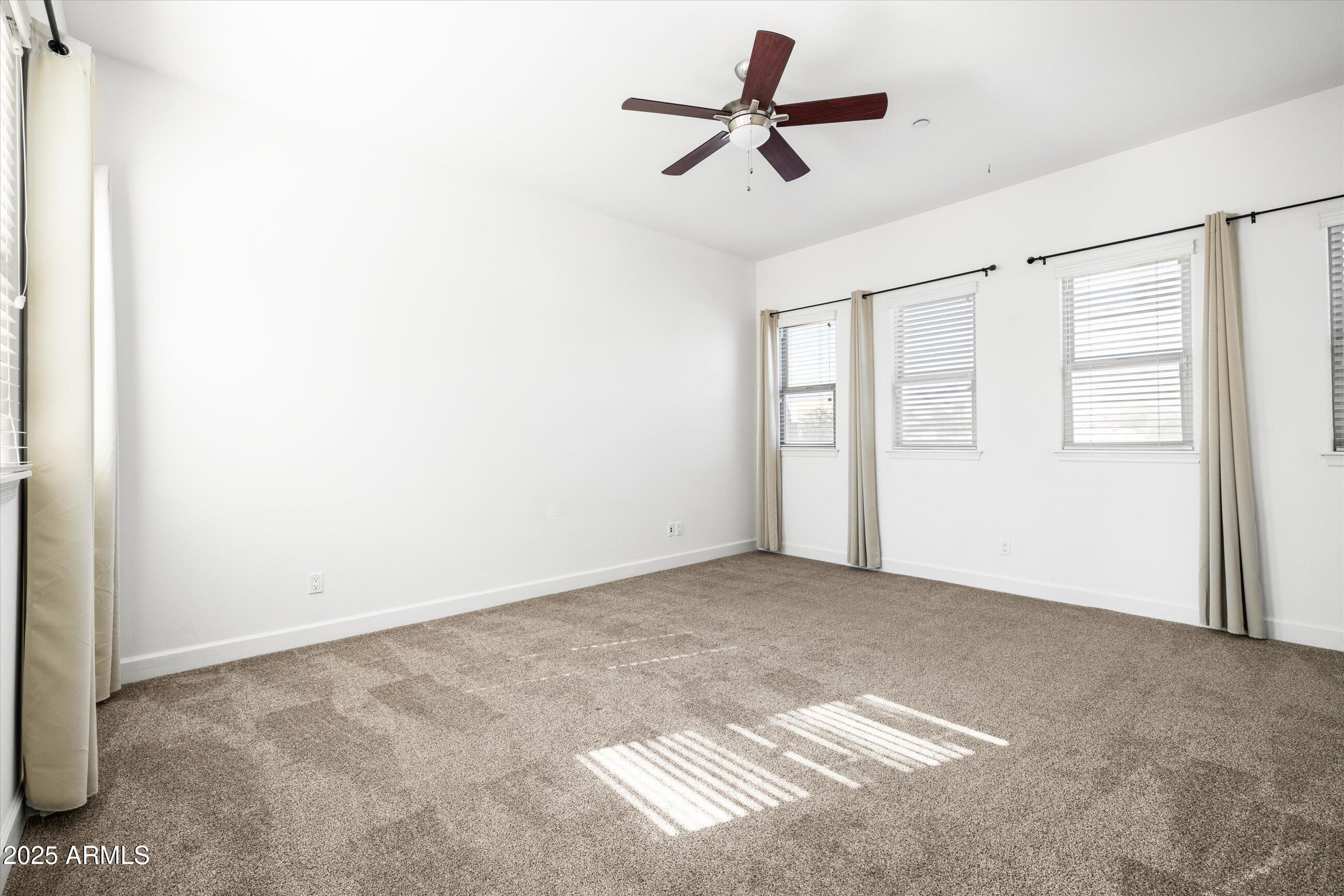 505 West 6th Street Tempe, AZ 85281 - Photo 17 of 32 a view of empty room with ceiling fan