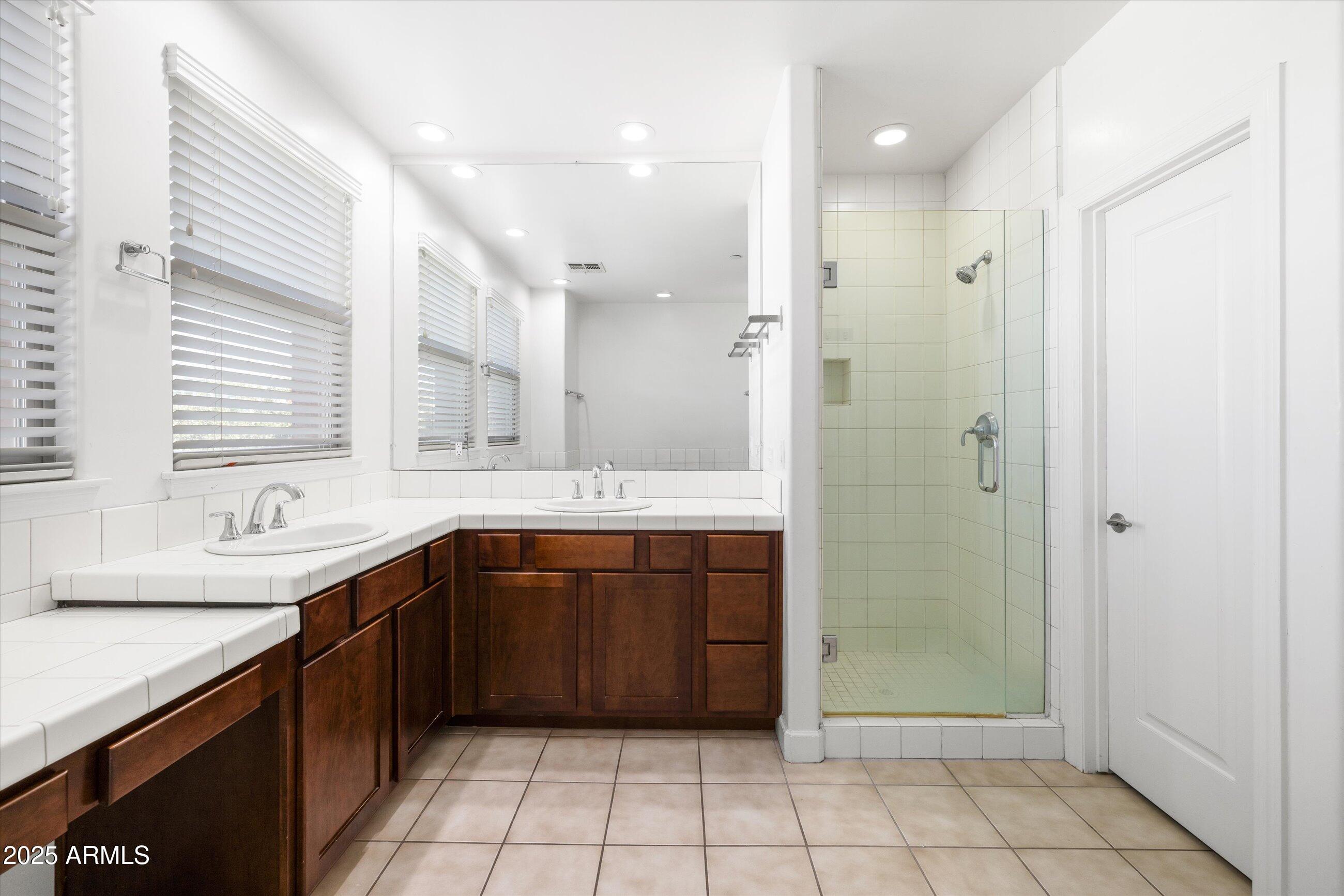 505 West 6th Street Tempe, AZ 85281 - Photo 20 of 32 a large bathroom with a sink a mirror and a shower