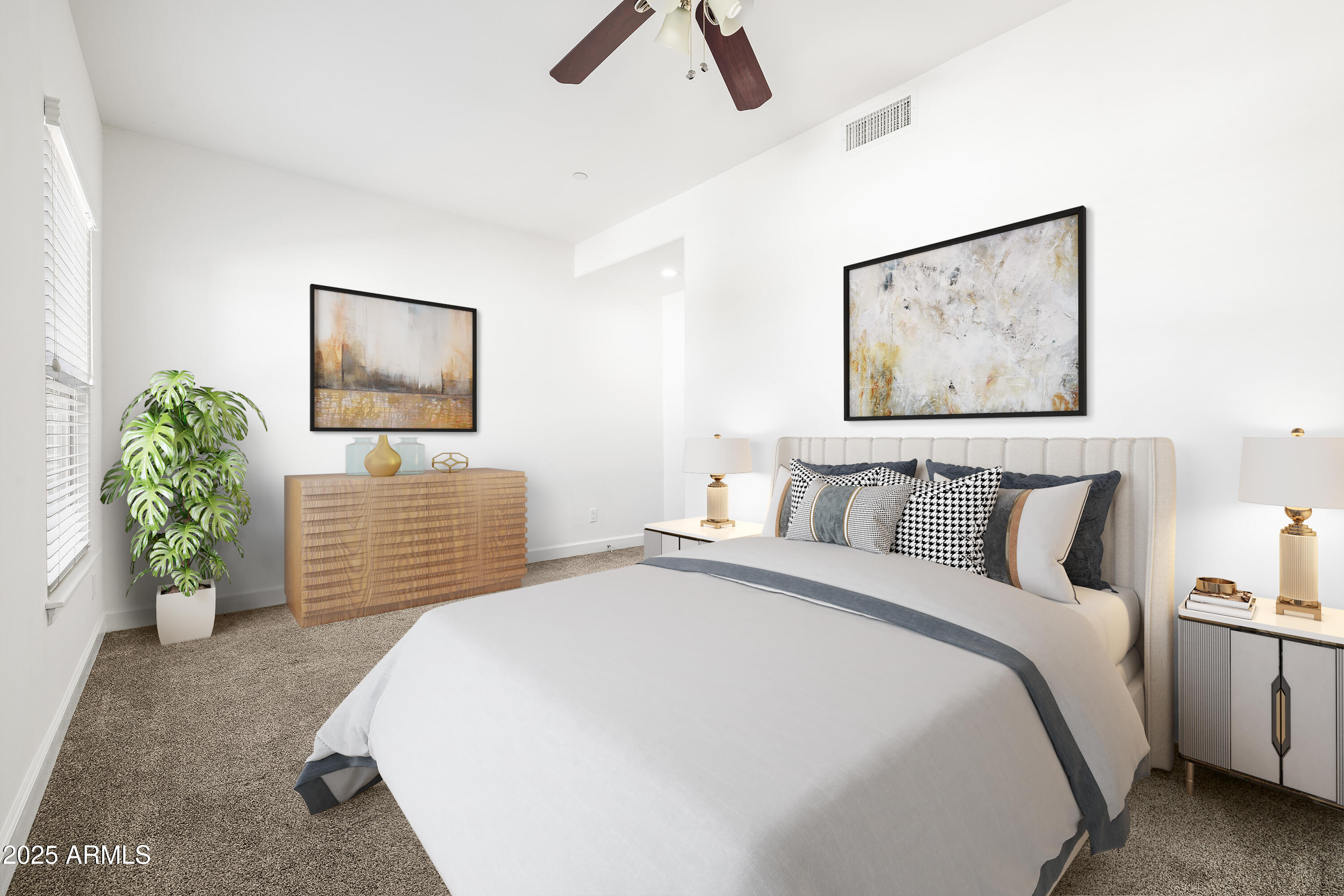 505 West 6th Street Tempe, AZ 85281 - Photo 21 of 32 a bedroom with a bed and a painting on the wall