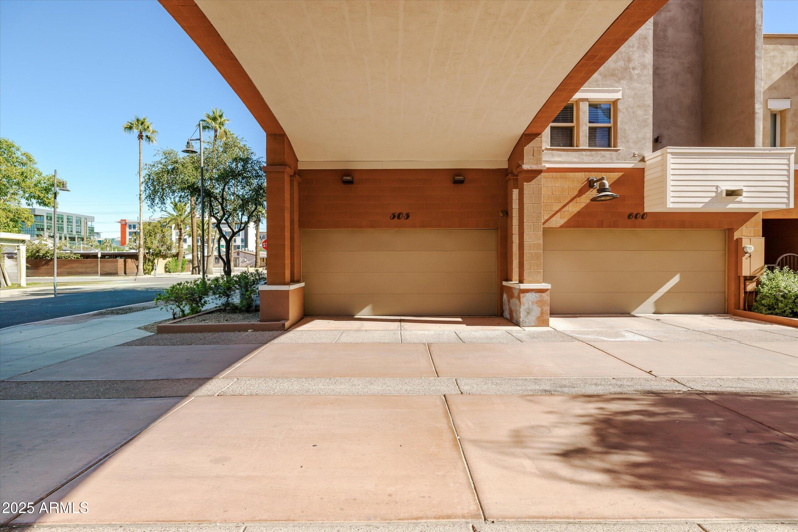 505 West 6th Street Tempe, AZ 85281 - Photo 28 of 32 a house with a yard and a parking space