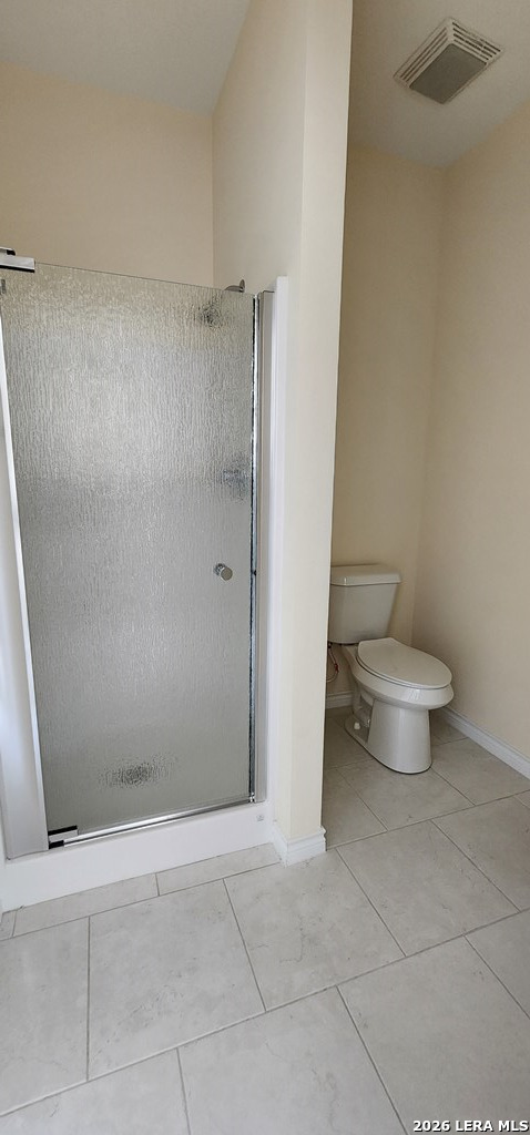 118 Grass Valley Road, Unit 201 Eagle Pass, TX 78852 - Photo 9 of 26 a bathroom with a toilet and a shower
