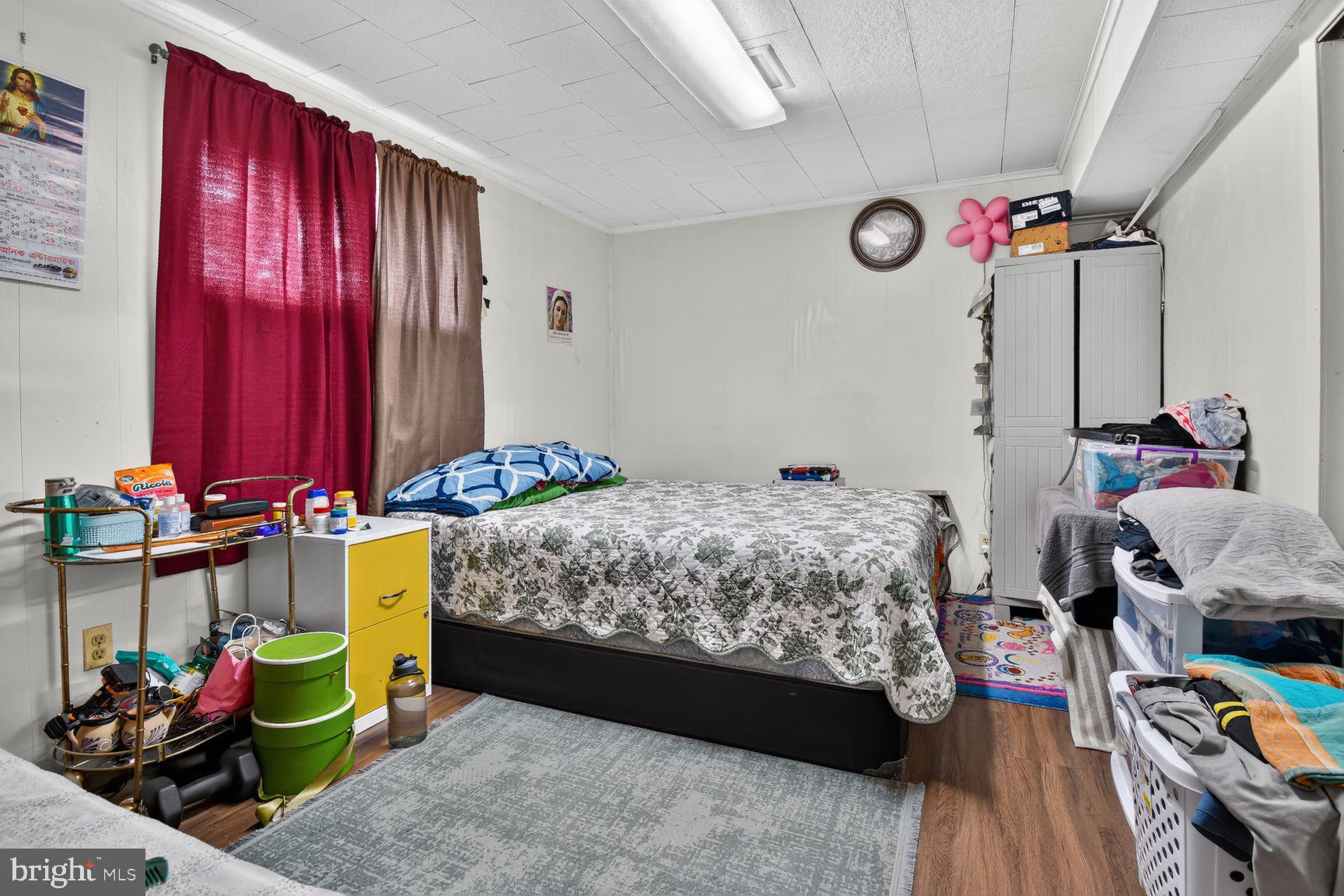1207 Oakview Drive Silver Spring, MD 20903 - Photo 18 of 25 Cozy bedroom with vibrant decor.