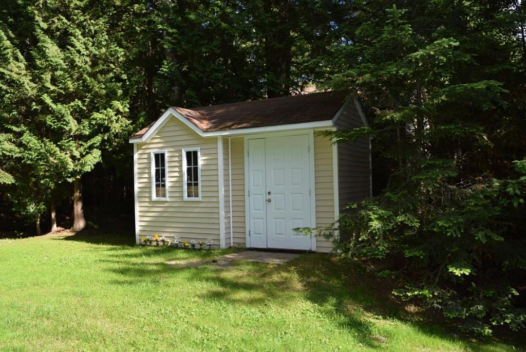571 Phinney Farm Road Lincoln, ME 04457 - Photo 5 of 30 Vinyl sided storage...