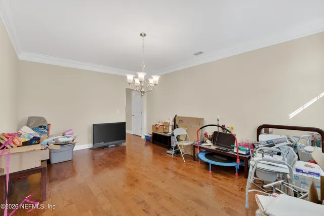a view of a livingroom with furniture and a couch