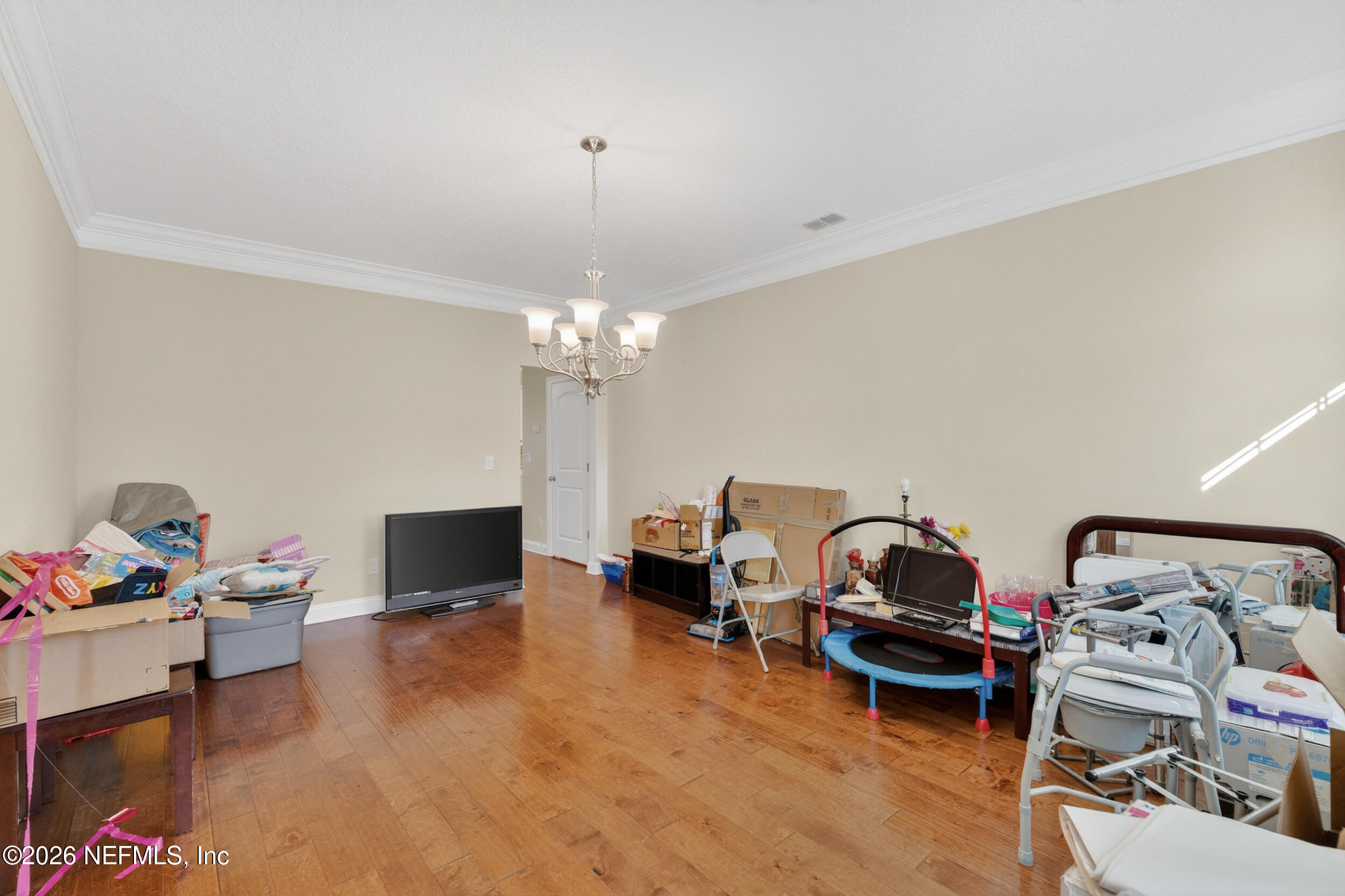 13576 Dunn Creek Road Jacksonville, FL 32218 - Photo 11 of 54 a view of a livingroom with furniture and a couch