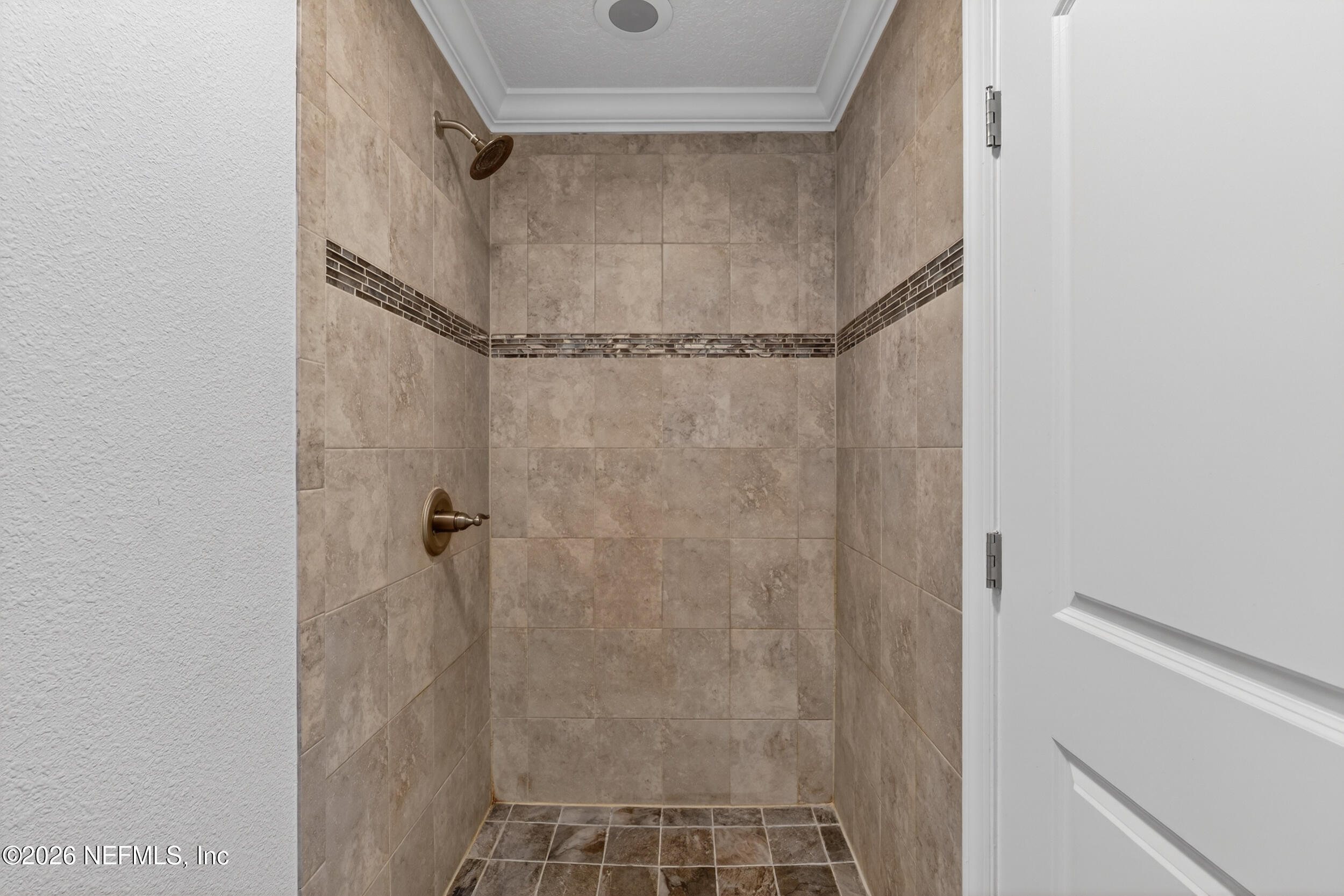 13576 Dunn Creek Road Jacksonville, FL 32218 - Photo 15 of 54 a bathroom with a glass door shower