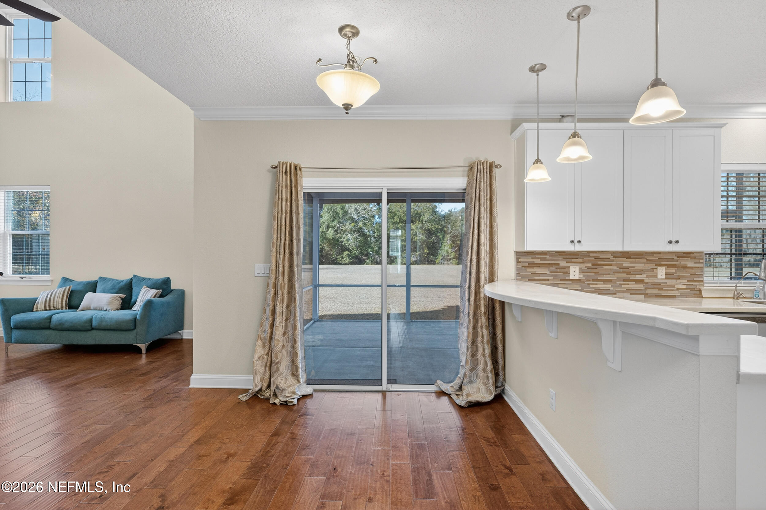 13576 Dunn Creek Road Jacksonville, FL 32218 - Photo 21 of 54 a view of an empty room and wooden floor