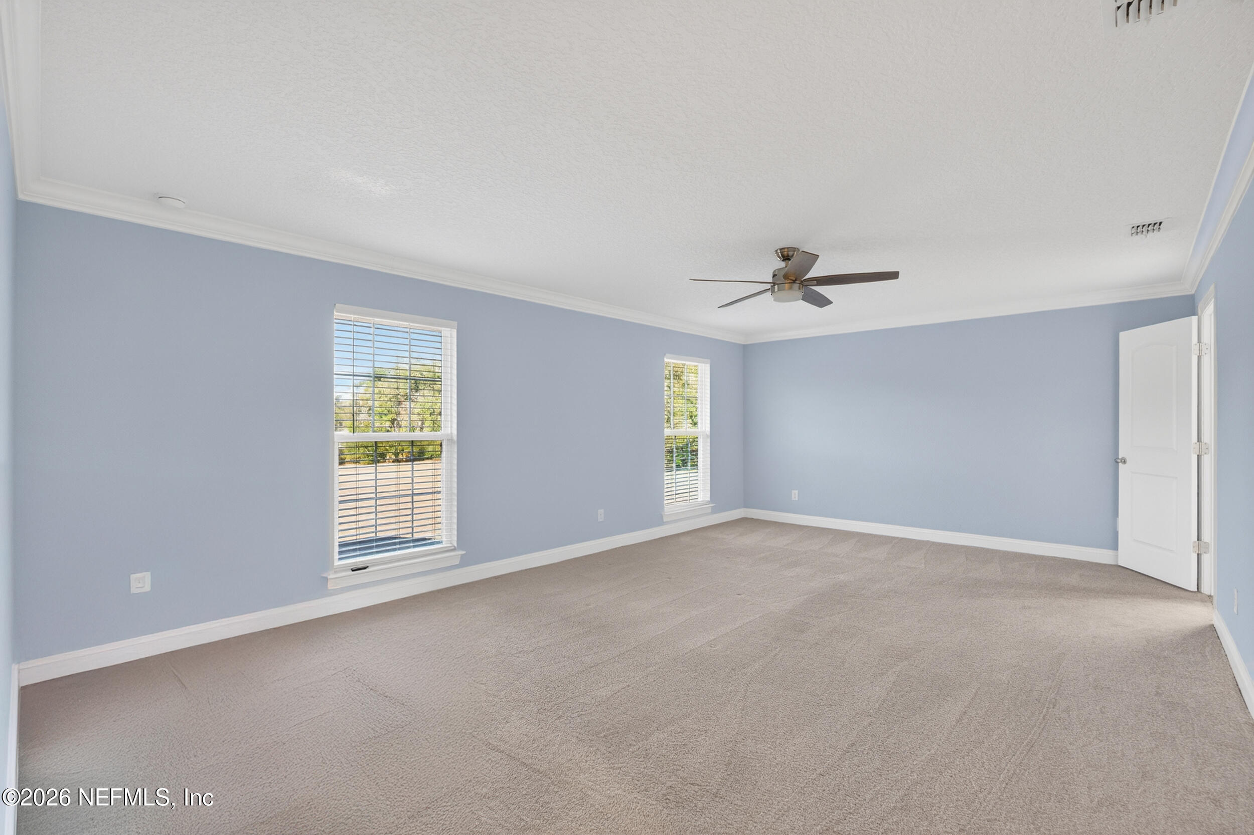 13576 Dunn Creek Road Jacksonville, FL 32218 - Photo 32 of 54 a view of an empty room with a window