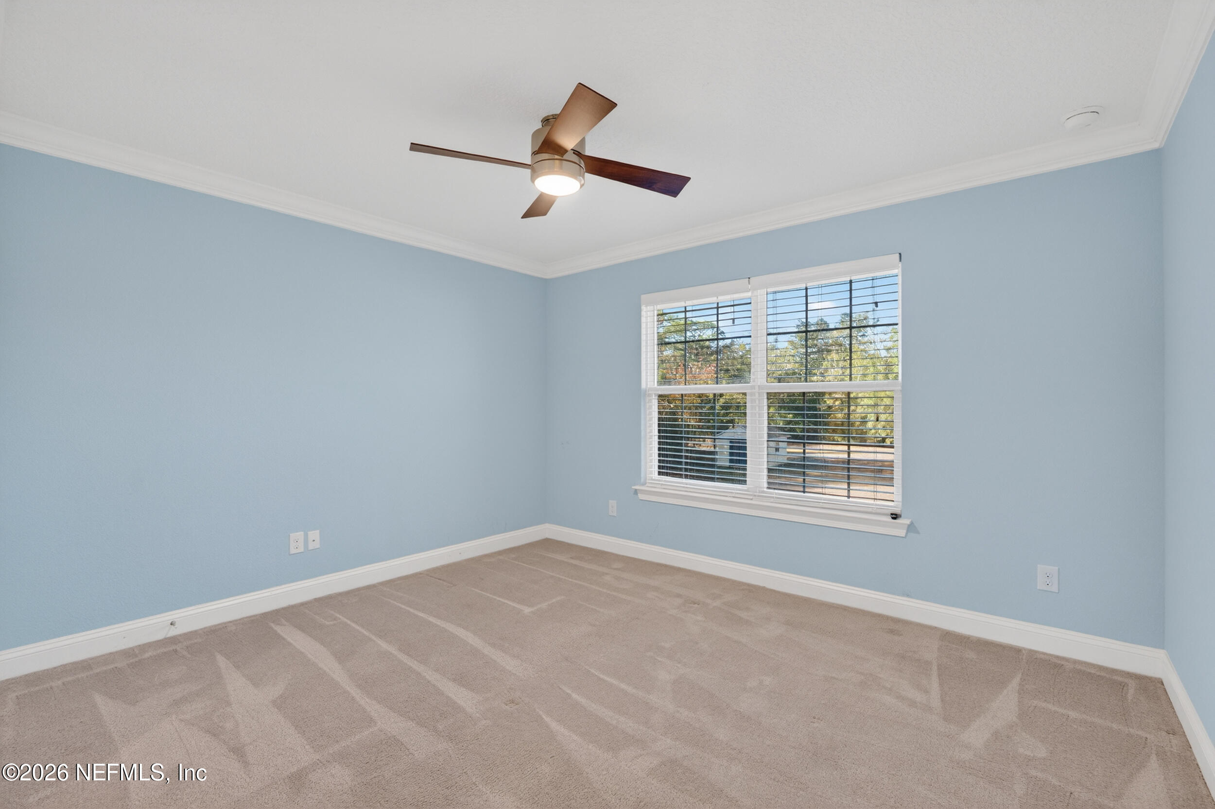 13576 Dunn Creek Road Jacksonville, FL 32218 - Photo 43 of 54 an empty room with a window