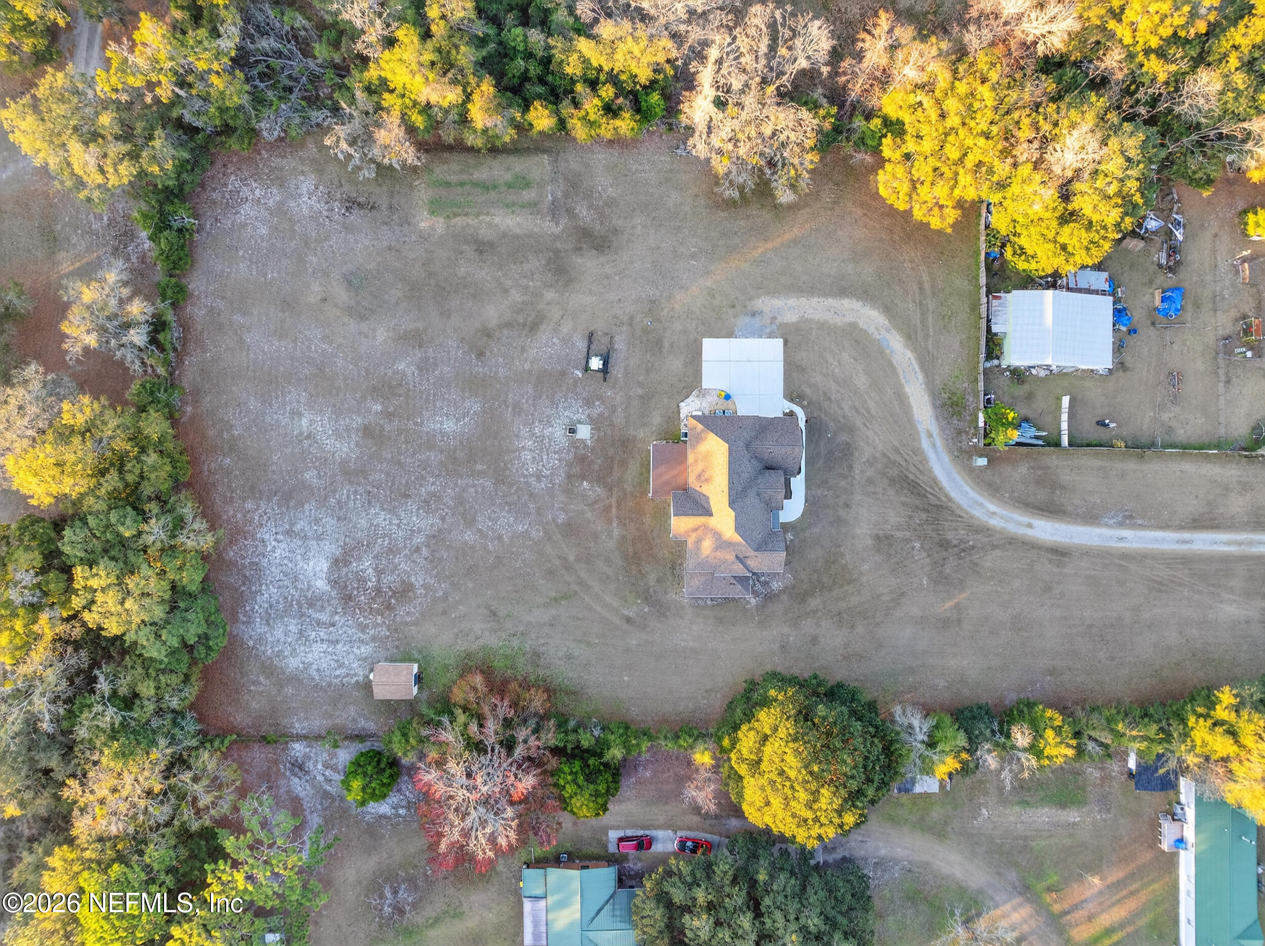 13576 Dunn Creek Road Jacksonville, FL 32218 - Photo 51 of 54 a vase of flowers sitting on a floor