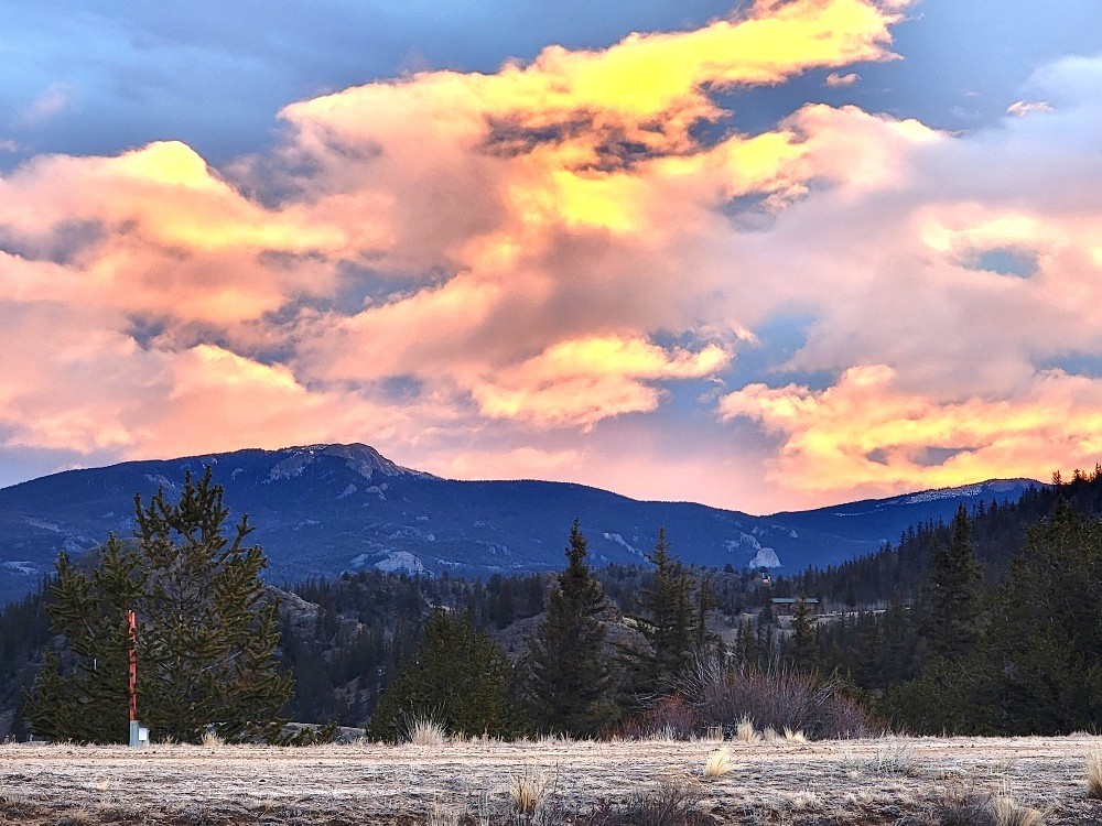 99 Hackney Lane Como, CO 80456 - Photo 3 of 49 a view of a house with a mountain