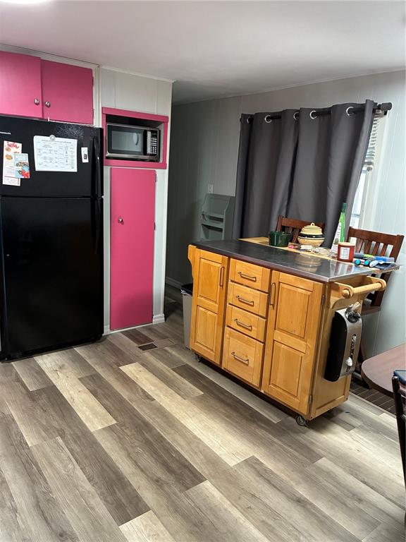 3896 Picciola Road, Unit 213 Fruitland Park, FL 34731 - Photo 4 of 12 a view of a room with gym equipment