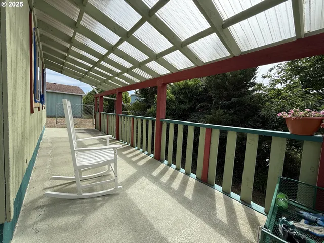 a view of a porch with furniture