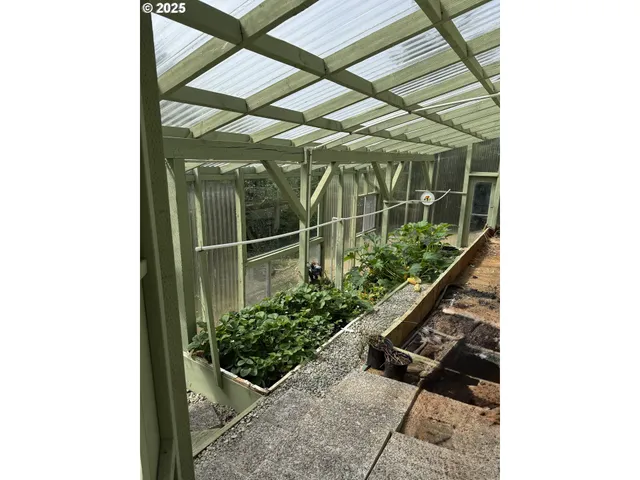 a view of a door and a yard