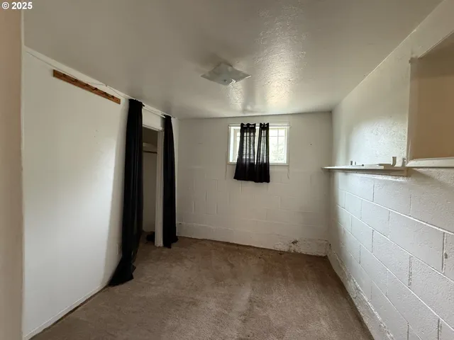 a view of a hallway with entryway