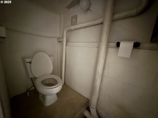 a bathroom with a sink and toilet