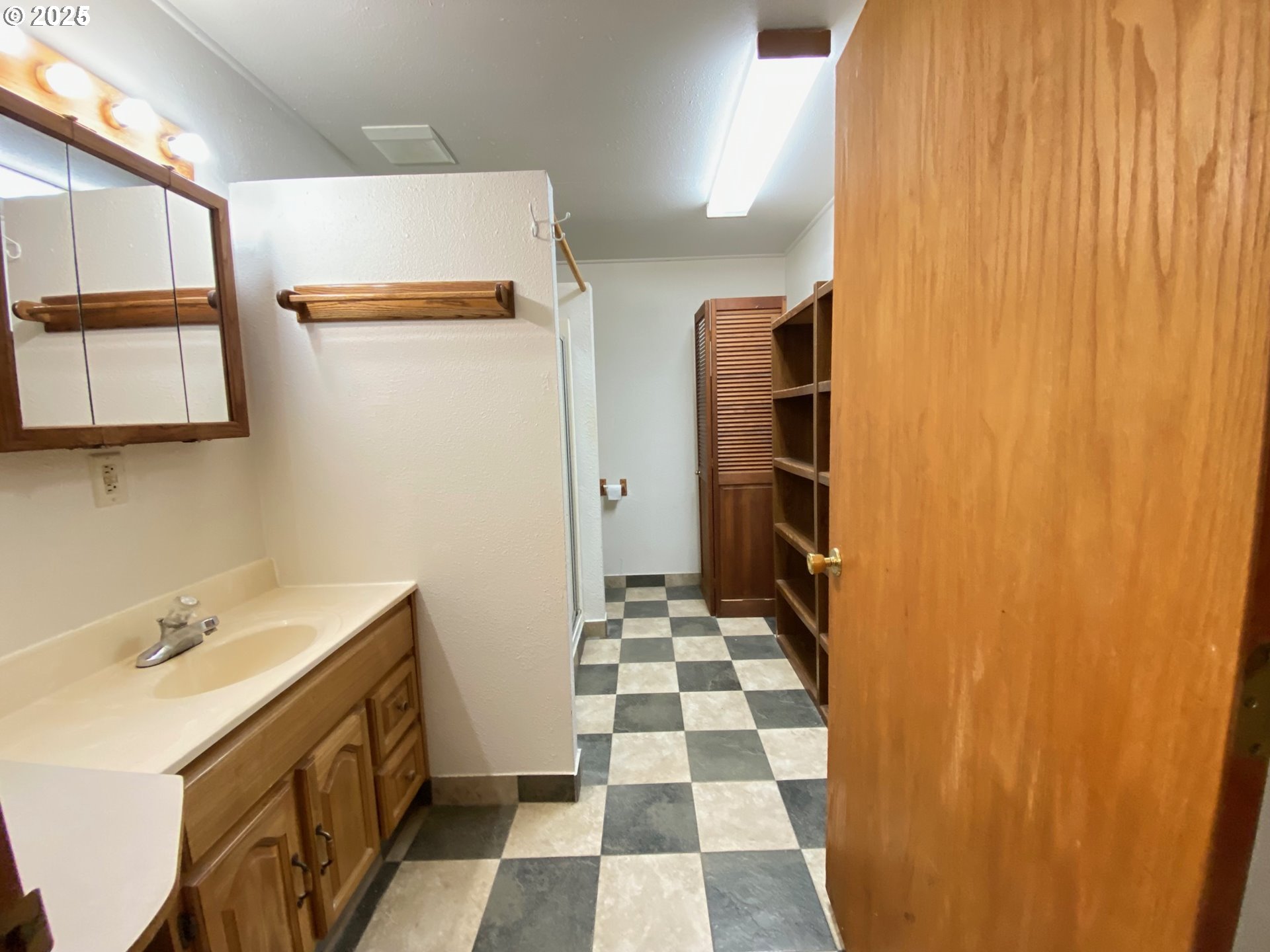 715 Jackson Avenue Coos Bay, OR 97420 - Photo 44 of 46 a bathroom with a sink and a shower