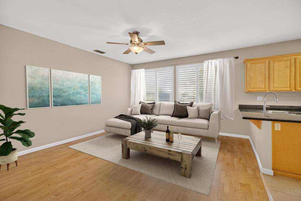 5817 Spring Flower Drive Elk Grove, CA 95757 - Photo 14 of 62 a living room with furniture and a large window