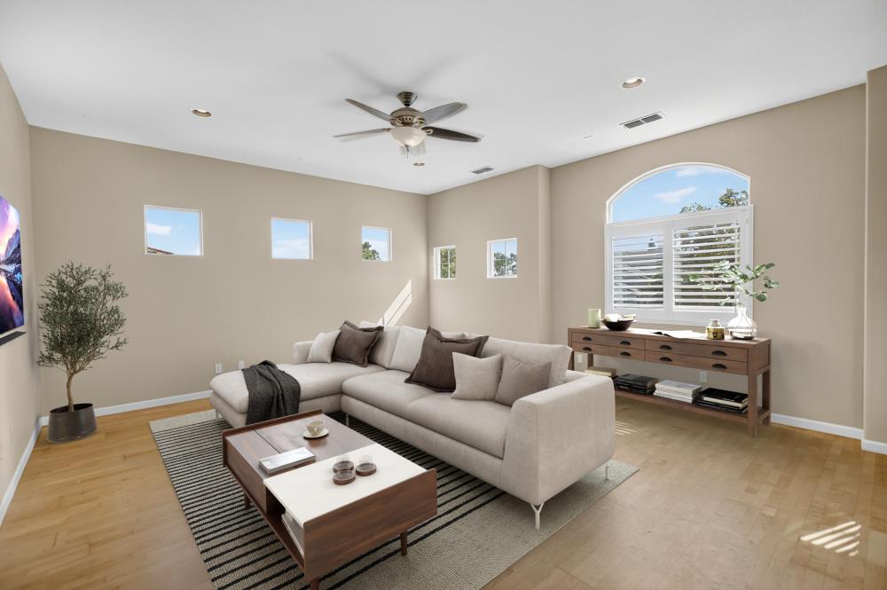 5817 Spring Flower Drive Elk Grove, CA 95757 - Photo 30 of 62 a living room with furniture and a window