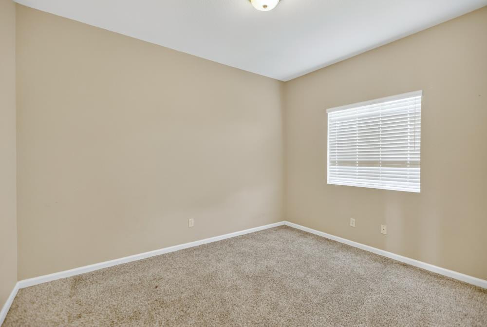 5817 Spring Flower Drive Elk Grove, CA 95757 - Photo 36 of 62 an empty room with a window