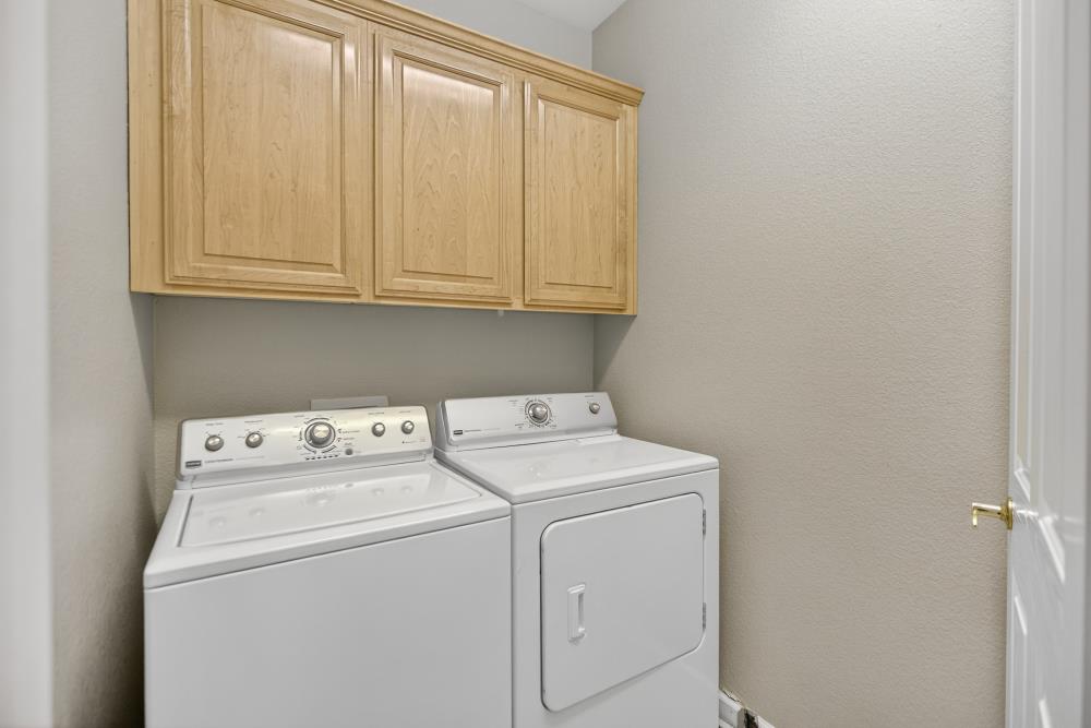 5817 Spring Flower Drive Elk Grove, CA 95757 - Photo 39 of 62 a utility room with dryer and washer