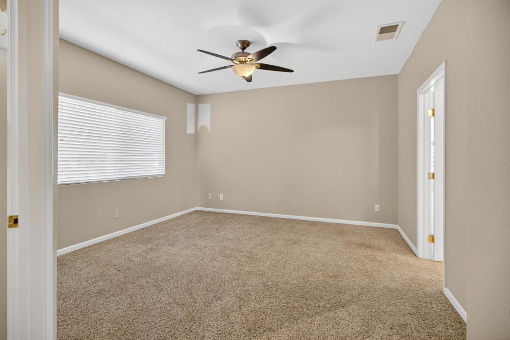 5817 Spring Flower Drive Elk Grove, CA 95757 - Photo 40 of 62 a view of an empty room with a window