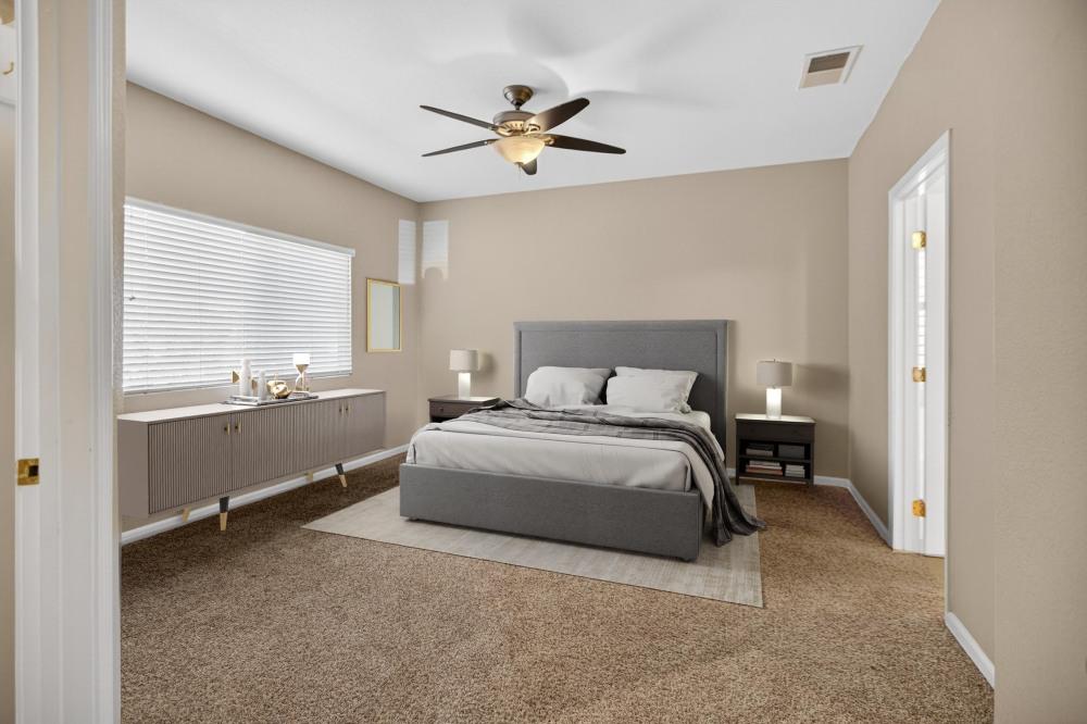 5817 Spring Flower Drive Elk Grove, CA 95757 - Photo 41 of 62 a bedroom with a bed and window