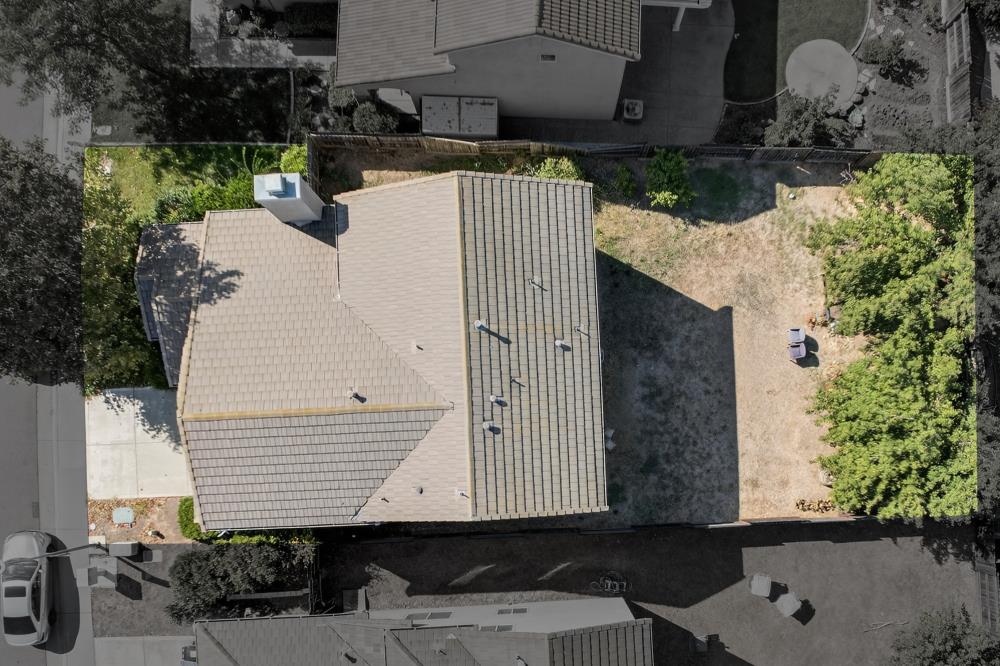 5817 Spring Flower Drive Elk Grove, CA 95757 - Photo 57 of 62 an aerial view of a house with a yard