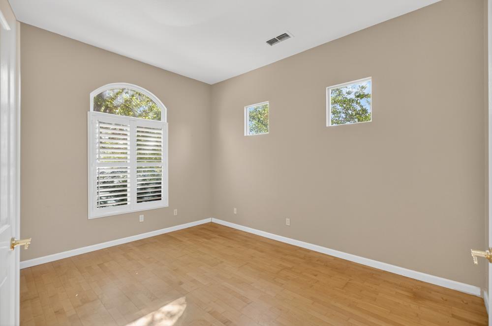 5817 Spring Flower Drive Elk Grove, CA 95757 - Photo 6 of 62 a view of an empty room with a window