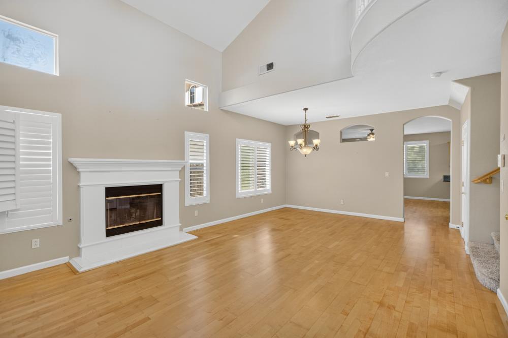 5817 Spring Flower Drive Elk Grove, CA 95757 - Photo 7 of 62 a view of an empty room with fire place and a fireplace
