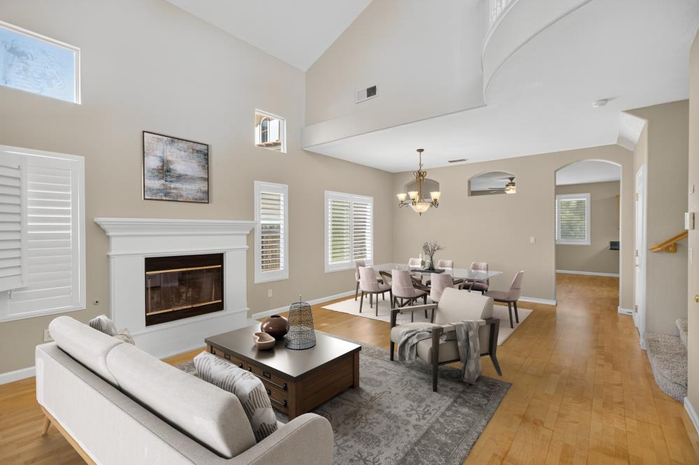 5817 Spring Flower Drive Elk Grove, CA 95757 - Photo 8 of 62 a living room with furniture and a fireplace