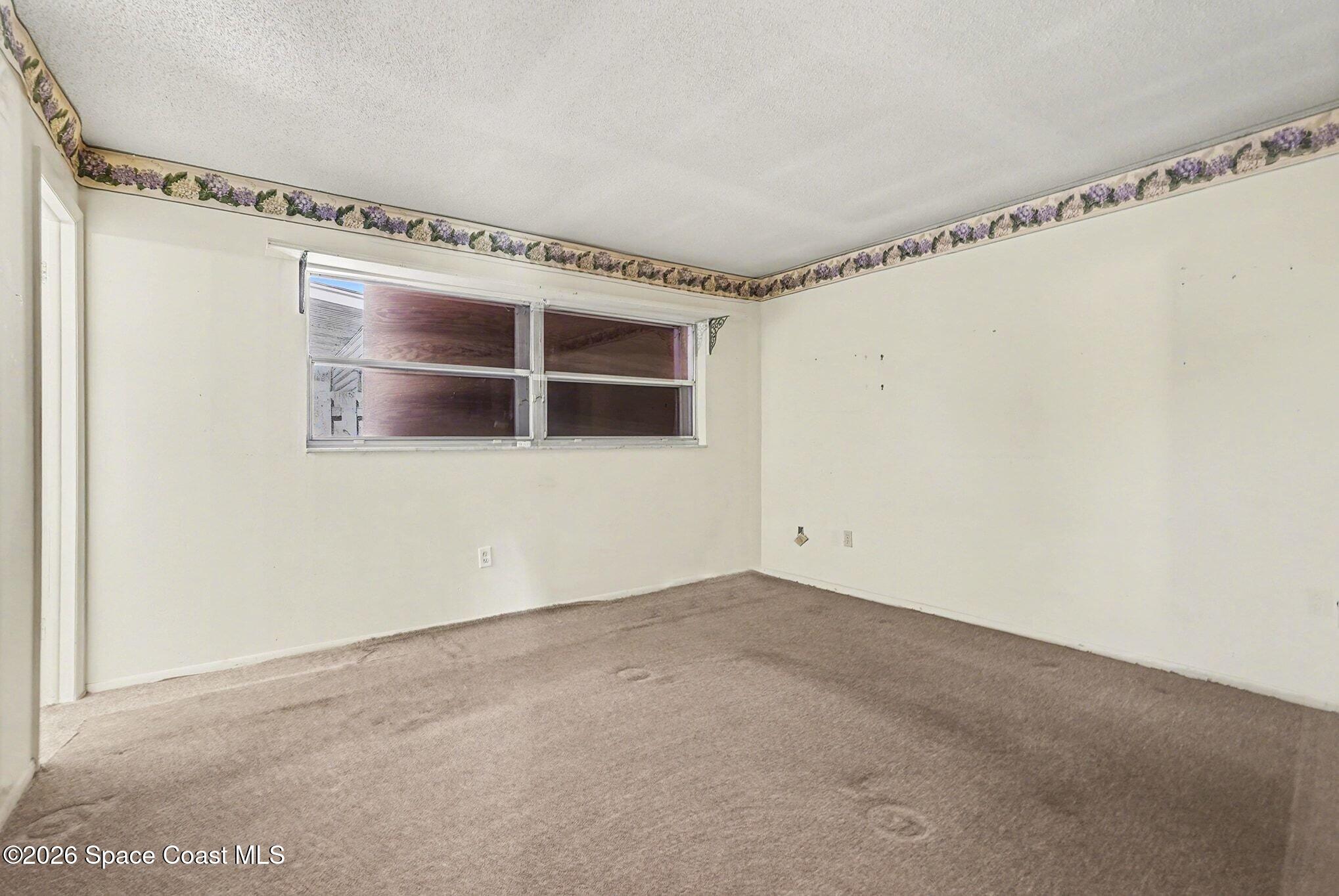 3205 Dade Circle Northeast Palm Bay, FL 32905 - Photo 13 of 35 a view of an empty room