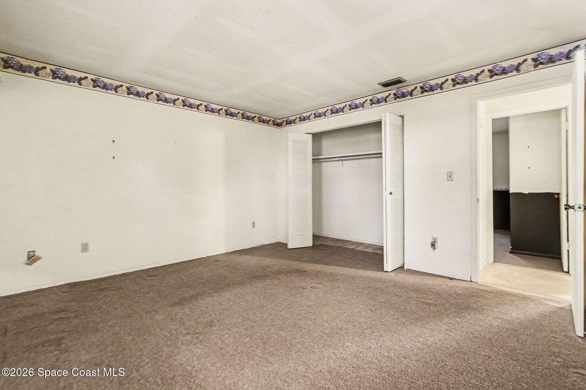 3205 Dade Circle Northeast Palm Bay, FL 32905 - Photo 14 of 35 a view of an empty room