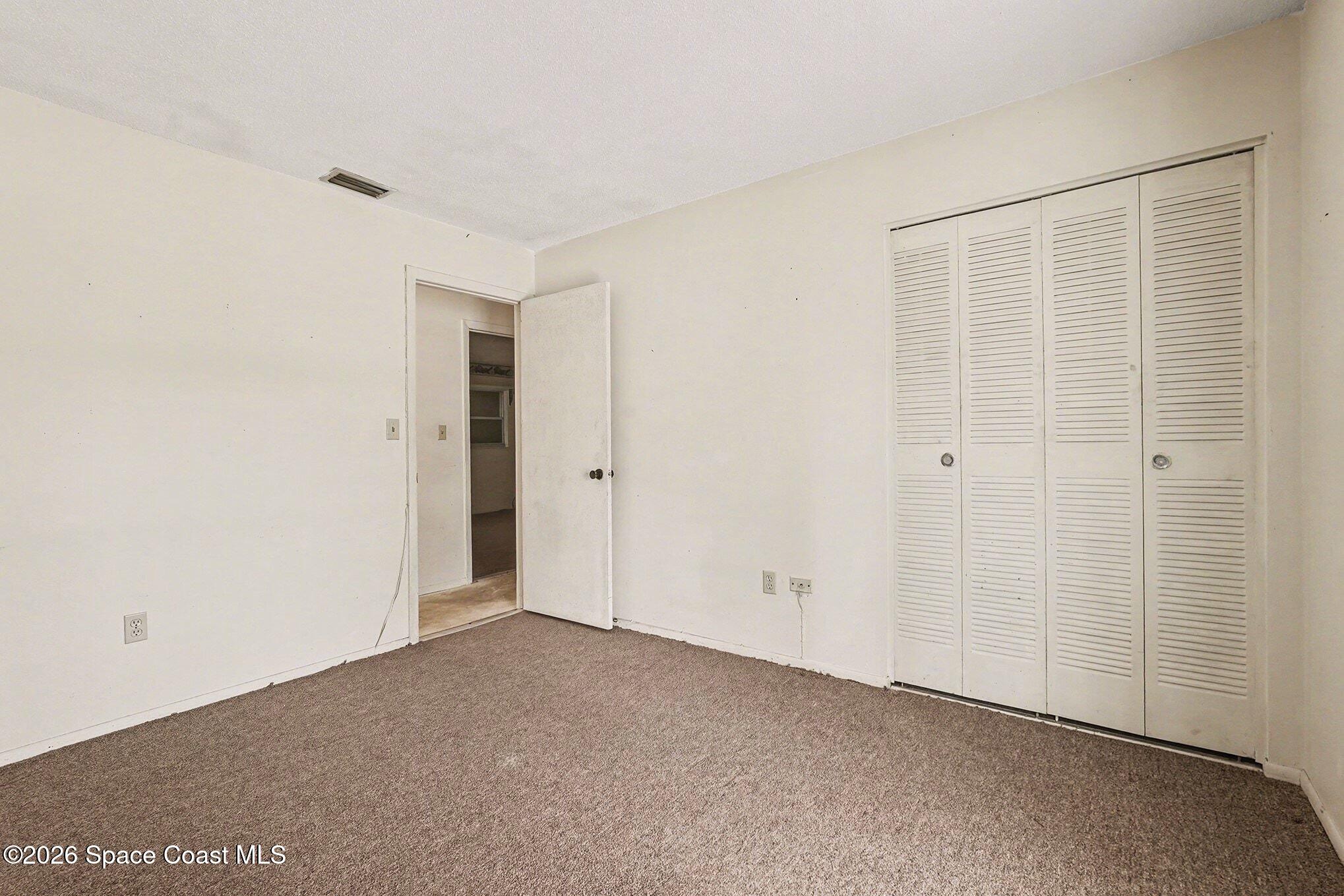 3205 Dade Circle Northeast Palm Bay, FL 32905 - Photo 17 of 35 a view of an empty room