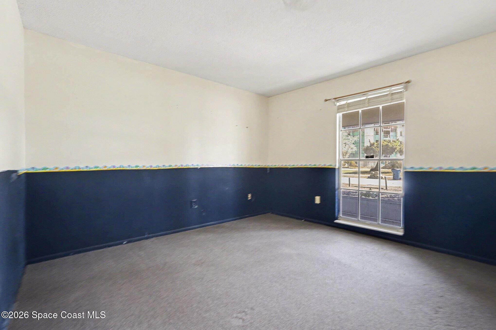 3205 Dade Circle Northeast Palm Bay, FL 32905 - Photo 19 of 35 a backyard of a house